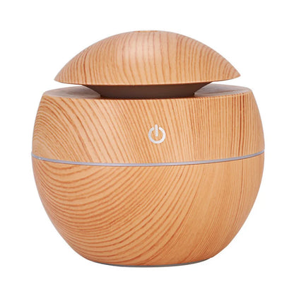 Mini nawilżacz powietrza USB w stylu drewna, ultradźwiękowy, z mgiełką, aromaterapią i kolorowym podświetleniem LED.
