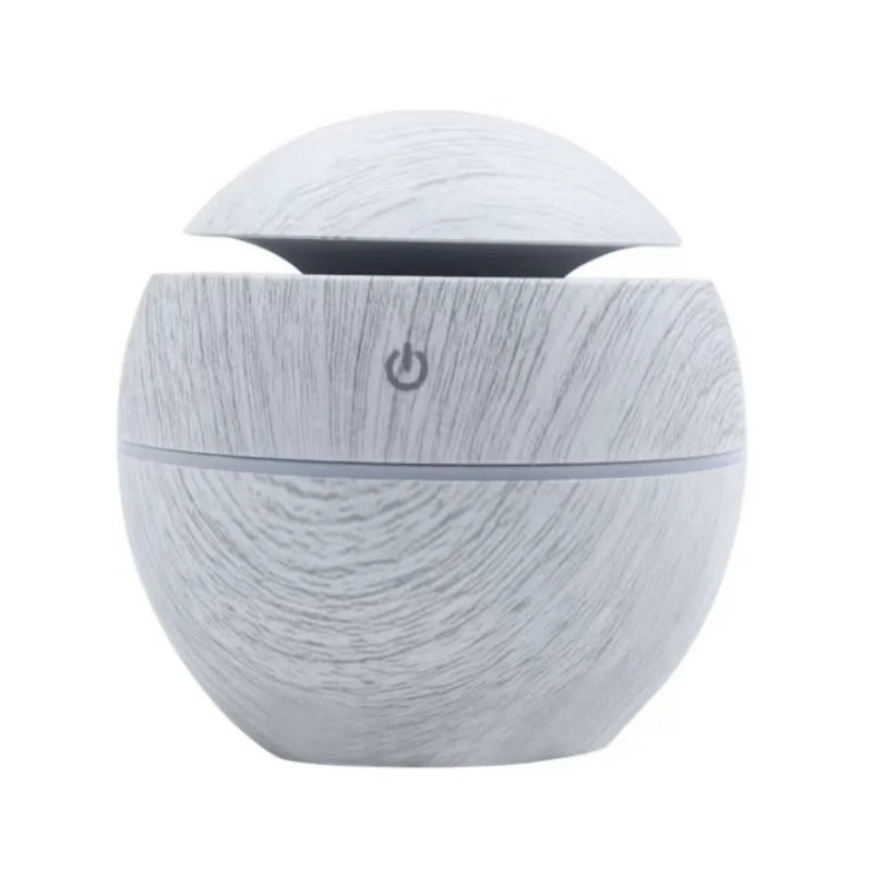 Mini nawilżacz powietrza USB w stylu drewna, ultradźwiękowy, z mgiełką, aromaterapią i kolorowym podświetleniem LED.
